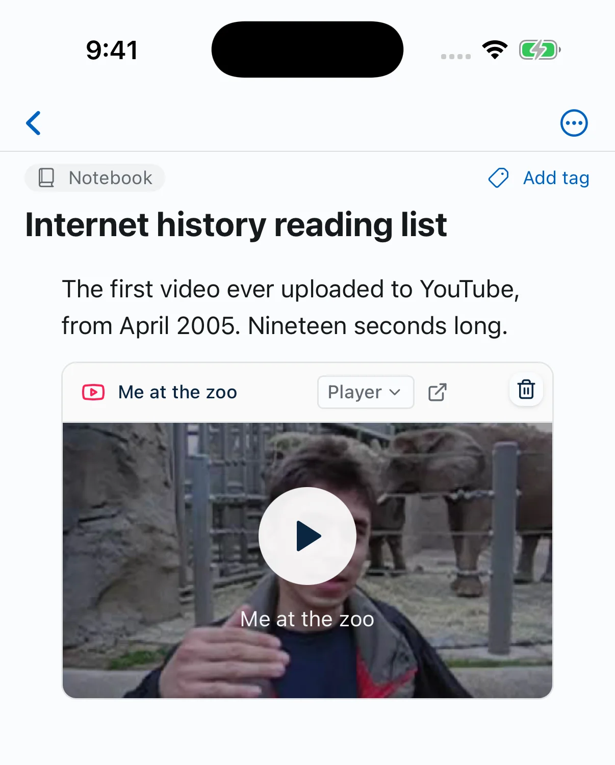 The same note on iPhone, with the video frame showing its title, the Player menu and the still with a play button