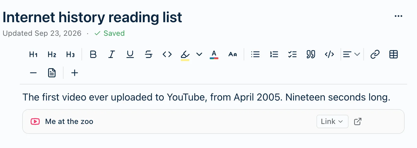 The same video in Link mode, shown as a single row with the YouTube icon, the title Me at the zoo, a Link menu and an open-in-new-window button